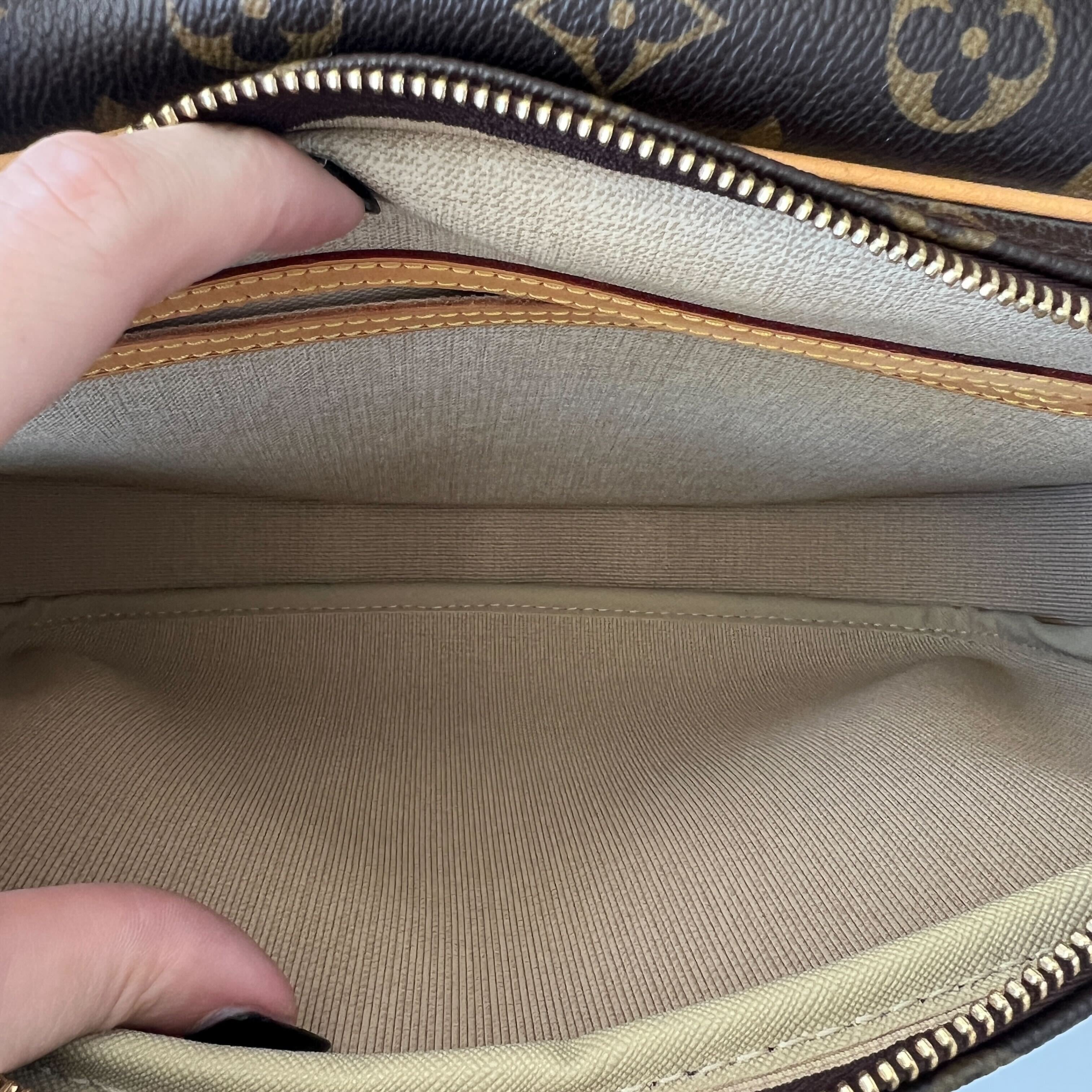 Louis Vuitton Reporter