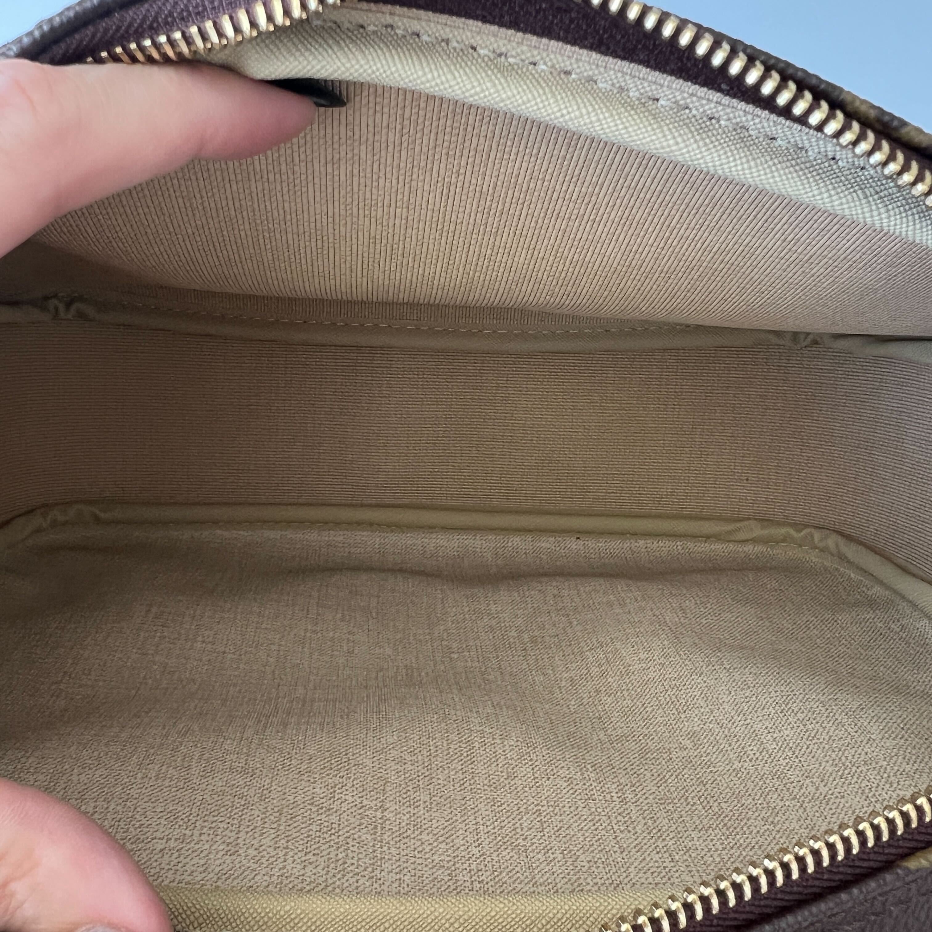 Louis Vuitton Reporter