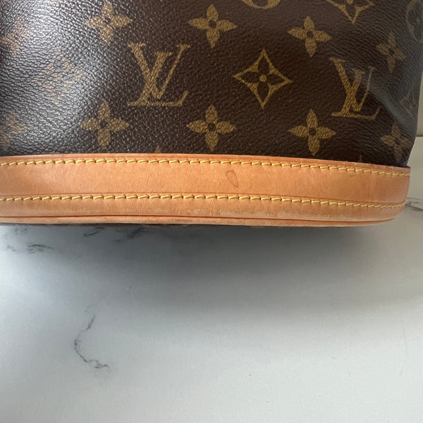 Louis Vuitton Bucket Bag & Pouch